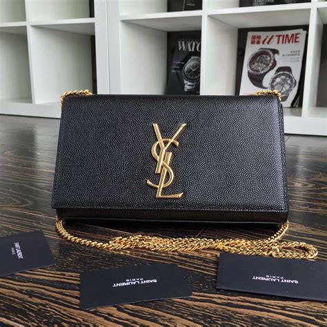 cross stones vintage clutch yves saint laurent|vintage saint laurent handbags.